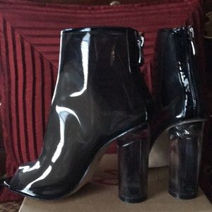 New clear blk peep toe booties.